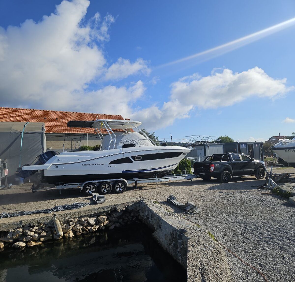 Boat positioned on land in dry marina in Zadar